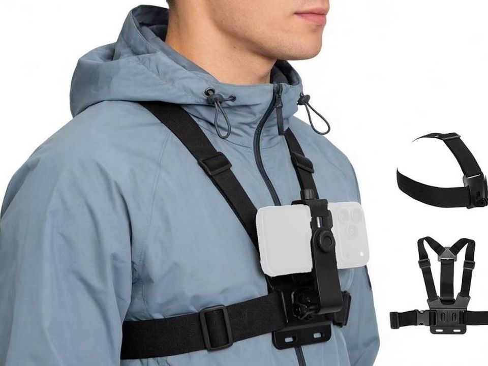 Employee wearing a chest harness holding a phone